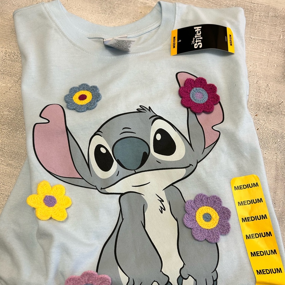 Stitch Graphic Short Sleeve Tee with Floral Accents short sleeve